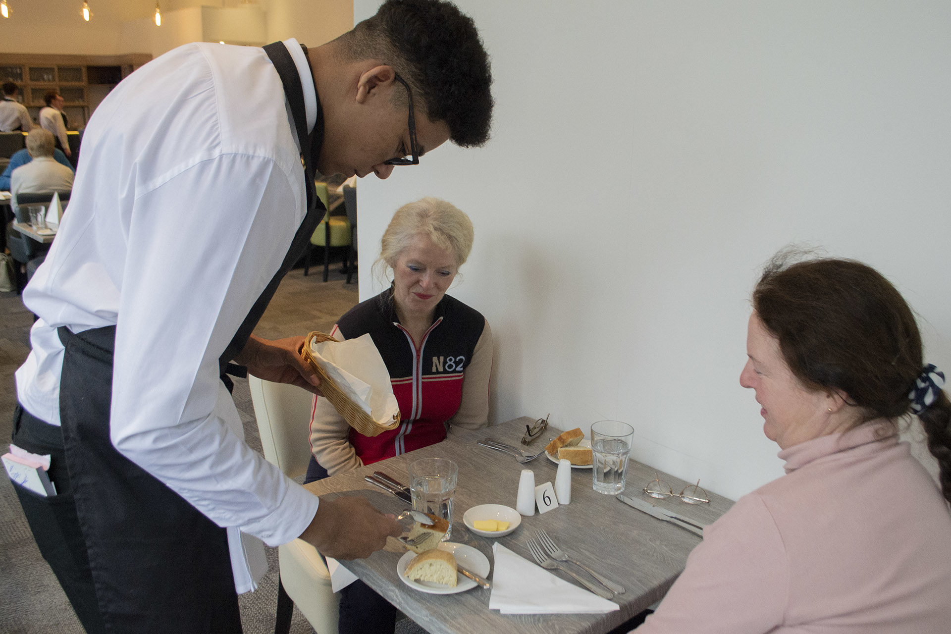 Hospitality - Student serving food